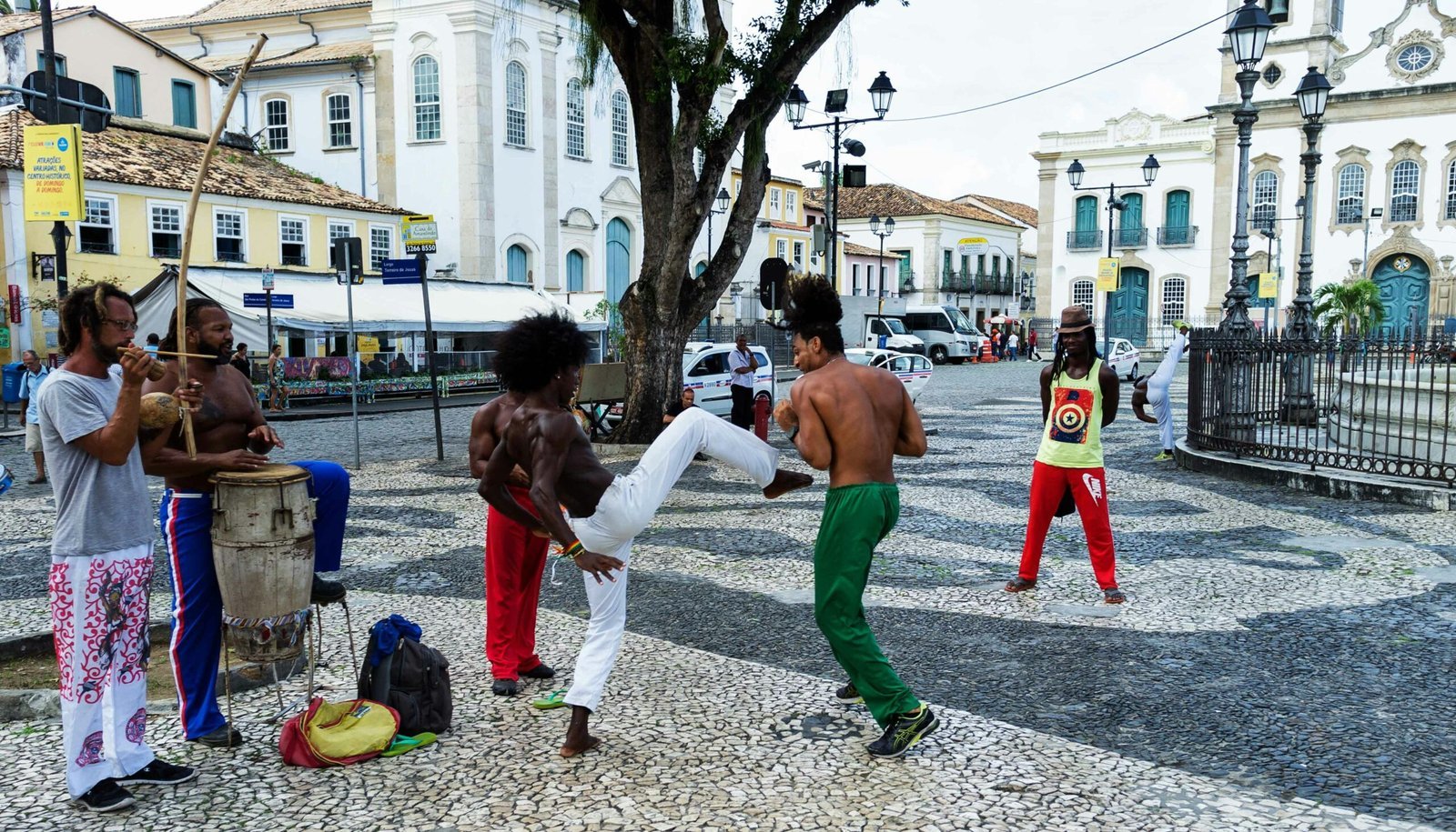 a group of people that are standing in the street